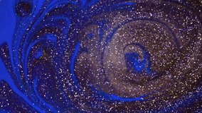 Bright sparkling particles in the form of a spiral on a blue background