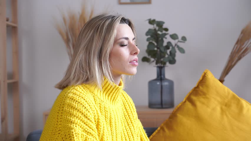 Young woman resting at home