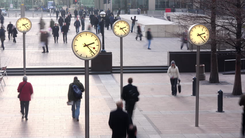 Timelapse of business people going to work in london dockland financial district . Royalty-Free Stock Footage #1101328421