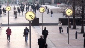 Timelapse of business people going to work in london dockland financial district . - Powered by Shutterstock - Get 15% off with code: PIKWIZARD15