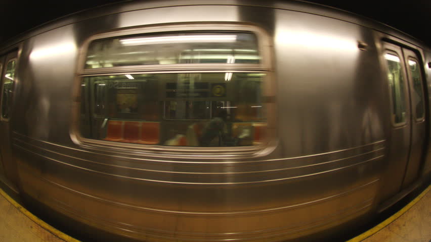 Fisheye shot of a new york subway train coming into the station Royalty-Free Stock Footage #1101328435