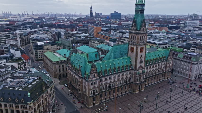 Drone shot revealing Hamburger Rathaus (Hamburg city hall) , Hamburg , Germany .