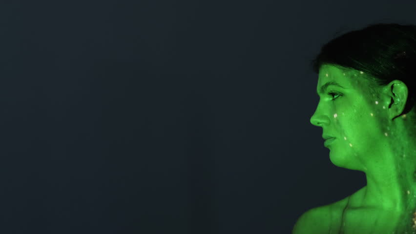 Regret healing. Double exposure woman. Melancholy stress. Depressed female silhouette posing navy gray background with green glare lights flickers overlay copy space.