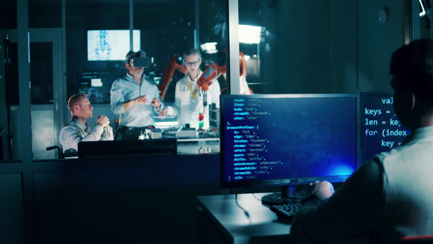 Robotic, innovation technology concept. Engineer is monitoring a robotics lab.