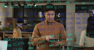 Animation of financial data processing over biracial businessman working in office. Global business, finances, computing and data processing concept digitally generated video.