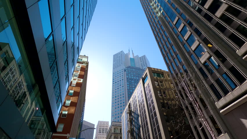 San Francisco city skyline. Futuristic city skyline. Look up view of business offices in downtown San Francisco. Low Angle View. California, San Francisco, Low angle view of modern skyscrapers.  Royalty-Free Stock Footage #1101344089