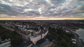 Establishing Aerial View Shot of Bristol UK, United Kingdom, morning sky, tracking through city