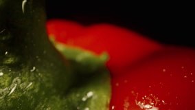 Sweet red pepper rotates and the camera slowly moves back. Macro. Isolate on a black background. - Powered by Shutterstock - Get 15% off with code: PIKWIZARD15