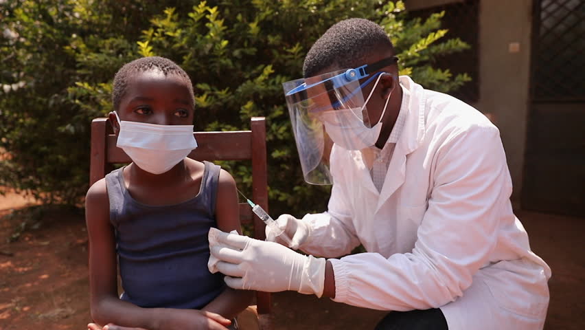 A doctor vaccinates a child at a vaccination center in Africa Royalty-Free Stock Footage #1101352059
