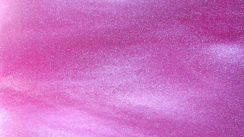 Flow of White Glowing Dust Particles In a Pink Liquid. White particles fly abstract on pink with depth of field. Magic galaxy moving background.