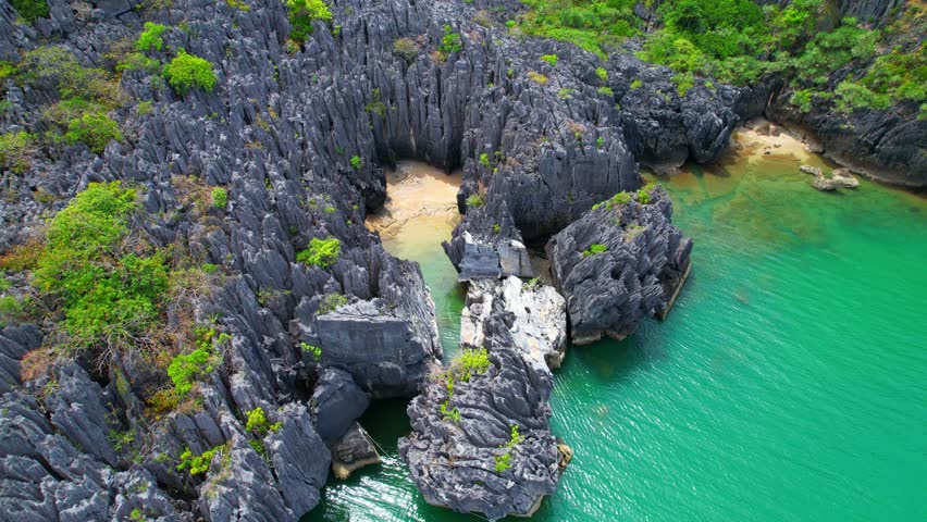Limestone mountains in tropical sea would reveal a stunning natural landscape of towering formations emerging from the azure waters of the Andaman Sea. (Prasat Hin Pan Yot, Satun province, Thailand)
