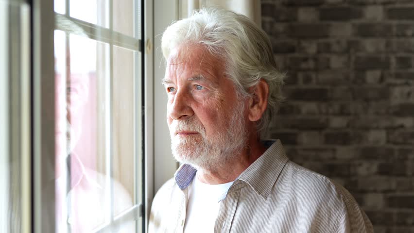 Pensive elderly mature senior man in eyeglasses looking in distance out of window, thinking of personal problems. Old woman wife consoling and hugging sad husband, copy space
 Royalty-Free Stock Footage #1101365049
