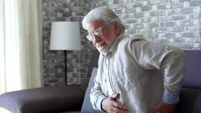 Upset senior elder man feel sudden back pain muscles ache tension injury sitting at home, sad old grandfather touching spine having lower lumbago backache osteoarthritis arthritis, backache concept
 - Powered by Shutterstock - Get 15% off with code: PIKWIZARD15