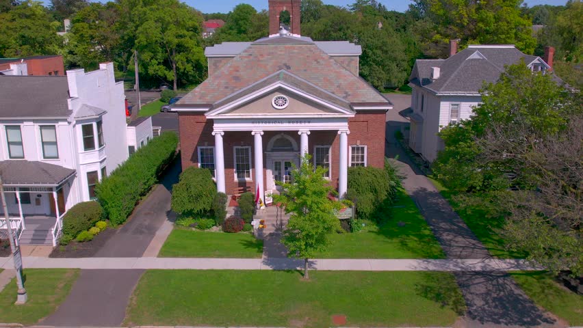 Drone shot pushing in on the Historical Museum and Research library for the Ontario County Research society in Canandaigua New York
