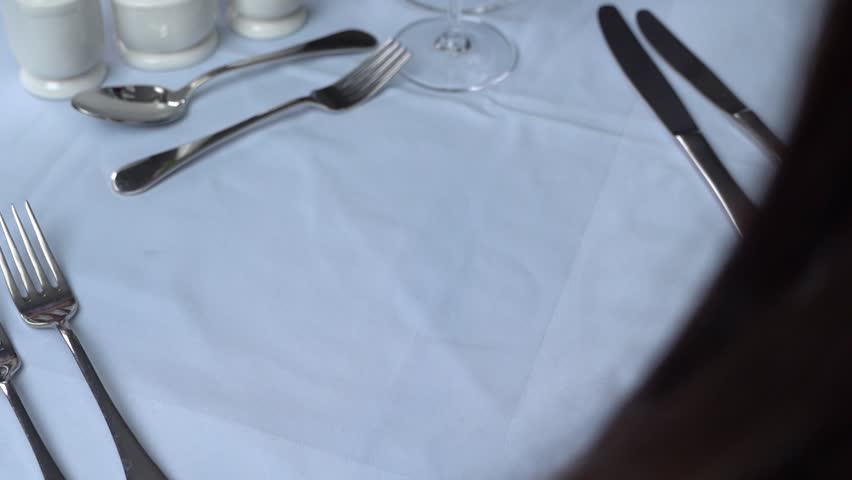 A gourmet dish is being served at a fancy dining table | Shutterstock HD Video #1101370585