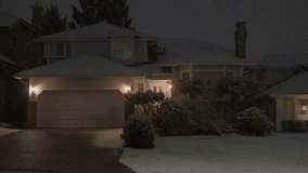 Establishing shot of luxury house with nice landscape at winter snowfall at night in Vancouver, Canada, North America. Night time on December 2022. ProRes 422 HQ. - Powered by Shutterstock - Get 15% off with code: PIKWIZARD15