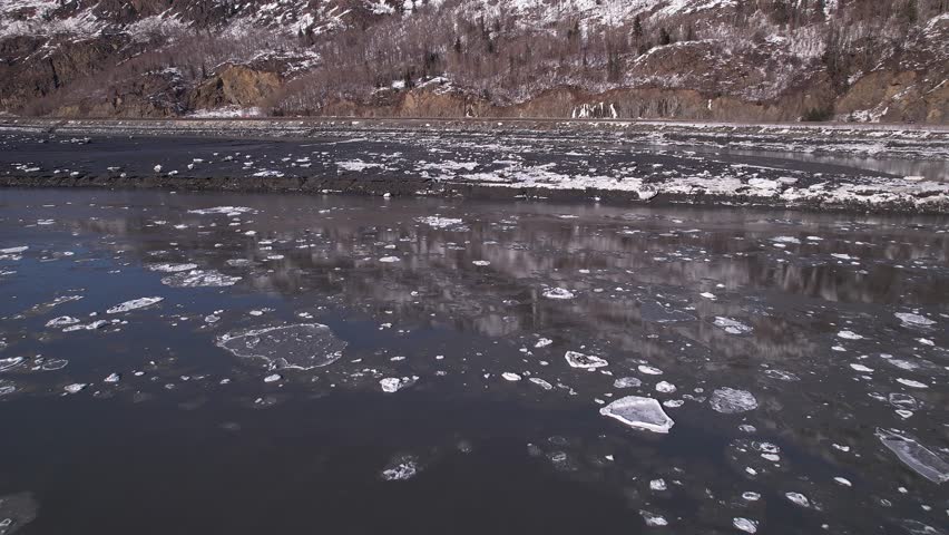 4k 23.98fps aerial video shot early Spring, in the Turnagain Arm, of the Cook Inlet. Anchorage, Alaska.