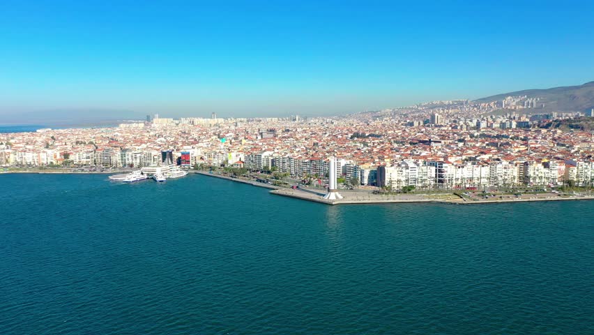 izmir karsiyaka district, sea and ferries and traffic n aerial view with drone on a sunny day Royalty-Free Stock Footage #1101400353