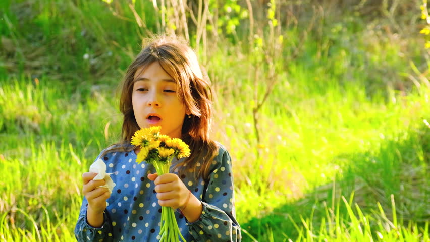 The child is allergic to flowers. Selective focus. Kid.