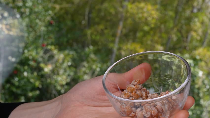 4K slow motion video of natto well mixed.