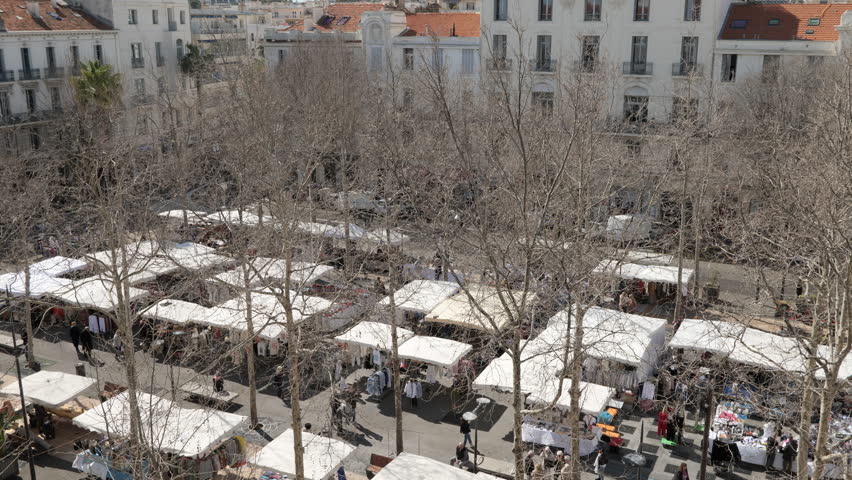 Street market, place de Gaulle, centre of Antibes. High angle view on sunny day in early spring.