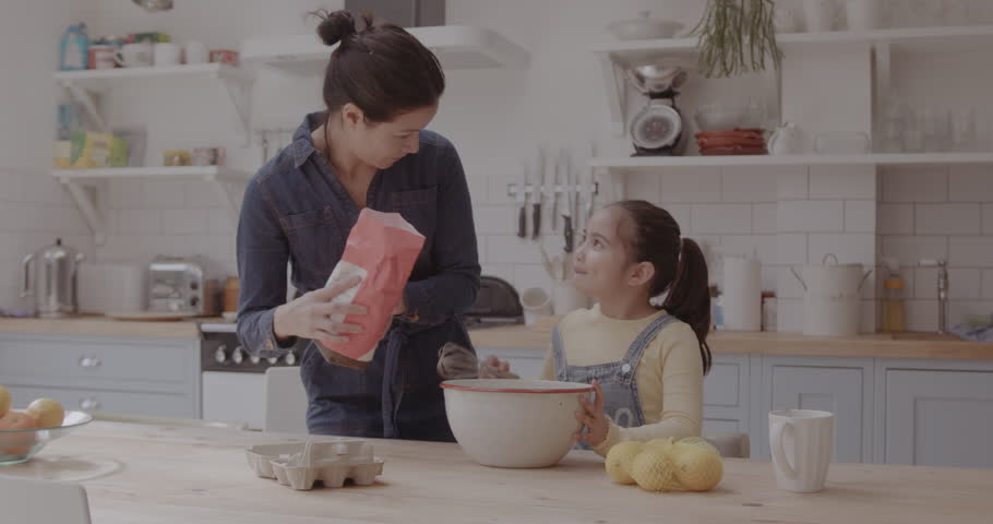 Mother and Daughter Making Pancakes in the Kitchen Royalty-Free Stock Footage #1101404953