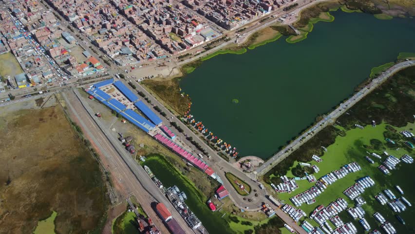 Aerial panorama of Puno with Lake Titicaca in Peru, South America