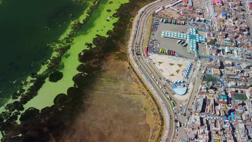 Aerial panorama of Puno with Lake Titicaca in Peru, South America
