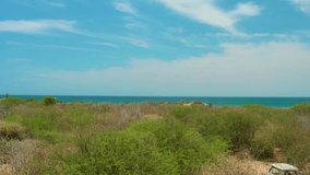 CABO PULMO LOS CABOS BCS MEXICO-2021: Drone Video Footage Captures Blue Ocean Waters By Sea Side Clouds Sunny