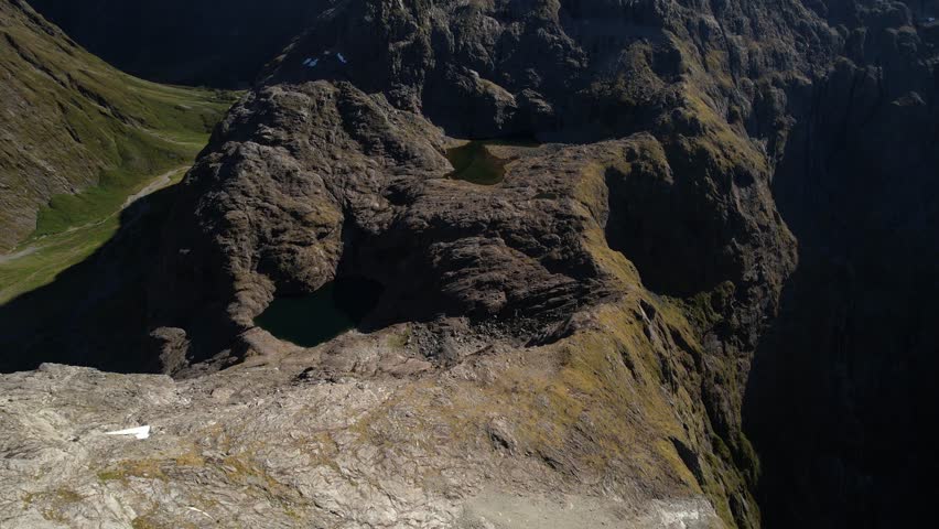 Drone reveal stunning alpine scenery of Southern Alps, New Zealand. Beautiful natural landscape of high peaks.