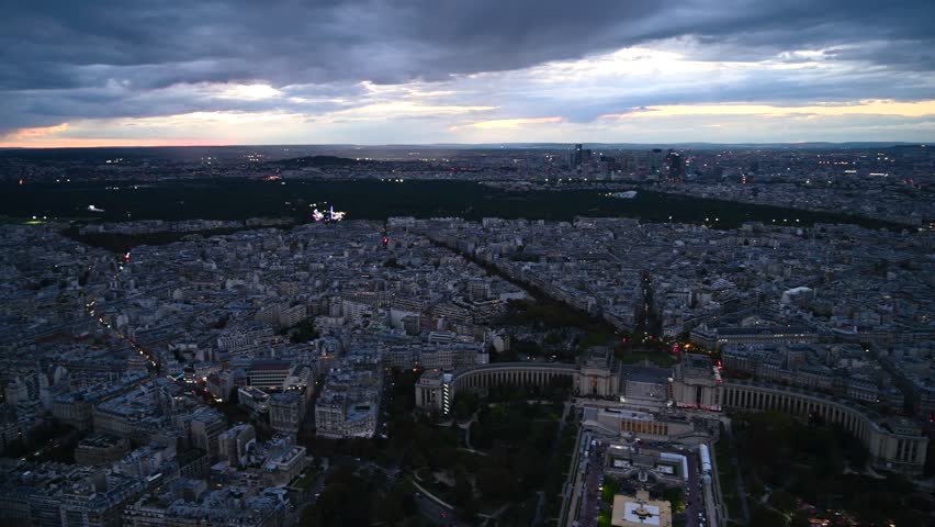 Paris city view from Eiffel Tower and river Seine with sunrise in Paris, France. Eiffel Tower is one of the most iconic landmarks of Paris. 4k video copyspace.