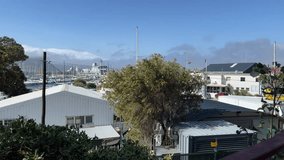 Navy ships docked in at the Simons Town navy dockyard - Powered by Shutterstock - Get 15% off with code: PIKWIZARD15