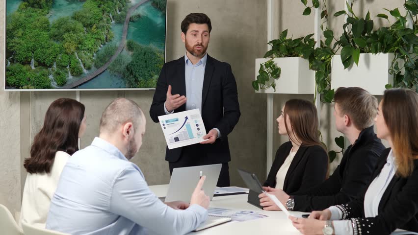 Business ecological meeting, people discuss solving environmental problems, reducing emissions, preserving the environment. Development, renewable energy, and responsible waste management.  Royalty-Free Stock Footage #1101435365