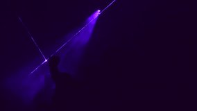 Night party people. People are dancing in a nightclub. Laser show party. Electronic music disco. Futuristic performance light show. Music video 4K footage.