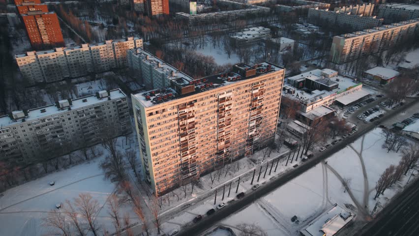 Aerial view. Winter panorama of the city of Tolyatti in the Samara region. Snow-covered streets of a provincial and industrial Russian city. Royalty-Free Stock Footage #1101444467