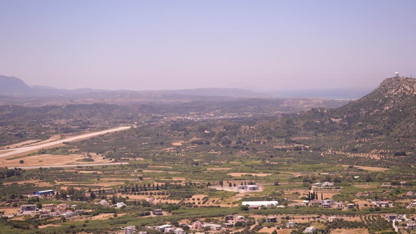 Panorama Of Mountains And Village On Rhodes Island In Greece. - panning right