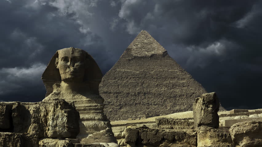 Great pyramid and sphinx and dark storm clouds in Giza Cairo, Egypt, 4k Royalty-Free Stock Footage #1101453061