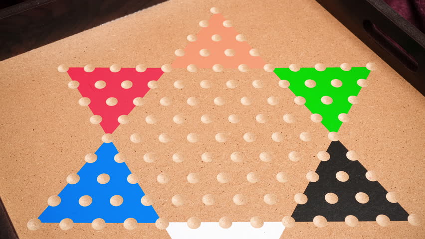 Chinese checkers board game stop motion video. Chinese checkers is a strategy board game. 4K resolution board game video.