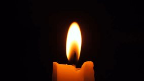 Burning Candle Wick Flame High Quality 4K Slow Motion Close-Up Macro Footage. Memorial Religious Romance Concept Dark Background. - Powered by Shutterstock - Get 15% off with code: PIKWIZARD15