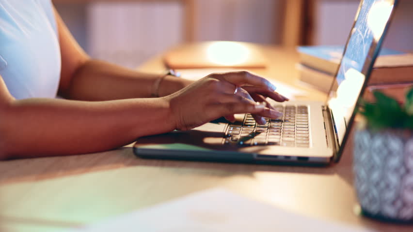 Laptop, business and hands of black woman typing working on online project, report and research at desk. Corporate office, planning and female worker writing email, productivity and busy on computer Royalty-Free Stock Footage #1101475365