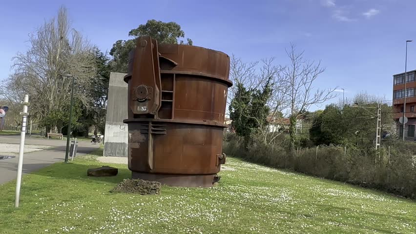 old steel furnace used as a sculpture