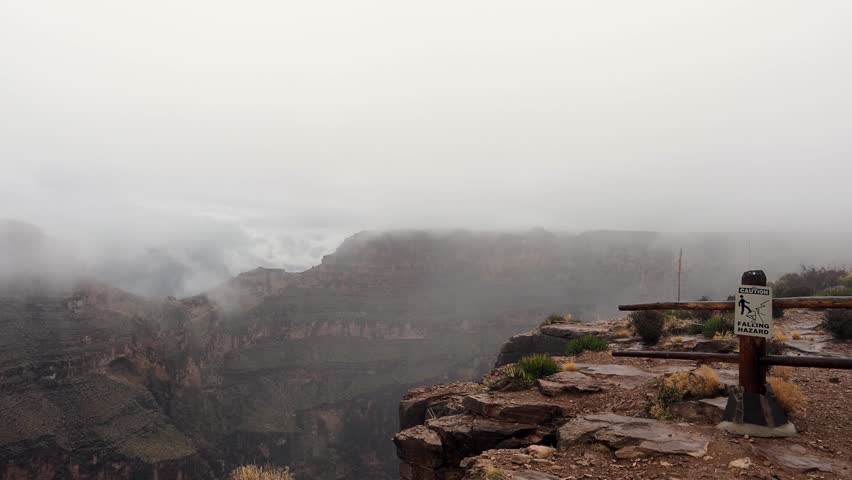 A dark day at Eagle Point of the Grand Canyon West Rim. This wonder of the world was full of clouds for a rare unique experience few see.
