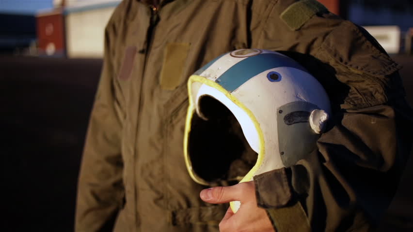 Air Force Pilot Holding his Flying Helmet at the Air Base. Midsection View. Close Up.