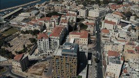 Tel Aviv - Jaffa, view from above. Modern city and the old city. Bird's-eye view. Israel, the Middle East. Aerial photography. Sea, skyline and blue cloudless sky. Drone video, quadcopter video.