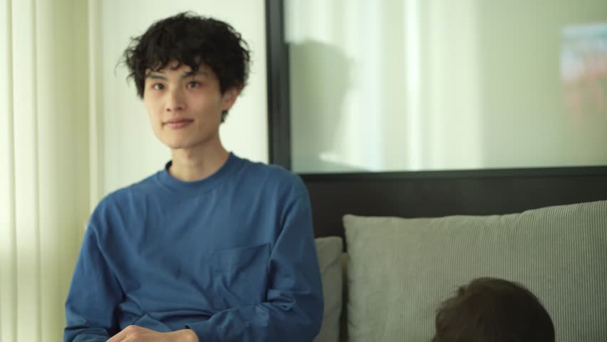 Family watching sports on TV
