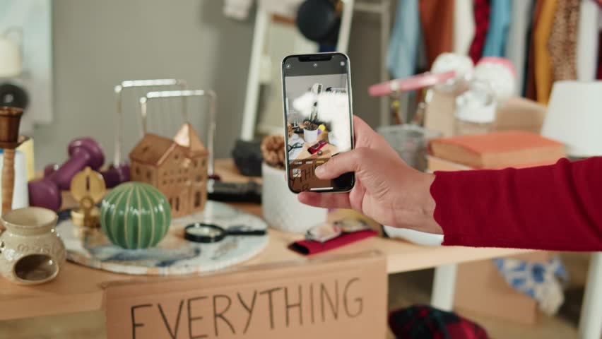Young Woman Buying Used Second Hand Recycled Sustainable Things. Charity Shop and Garage Sale, Buyer Taking Photo on Smartphone, Recycling Eco New Life, European Store.