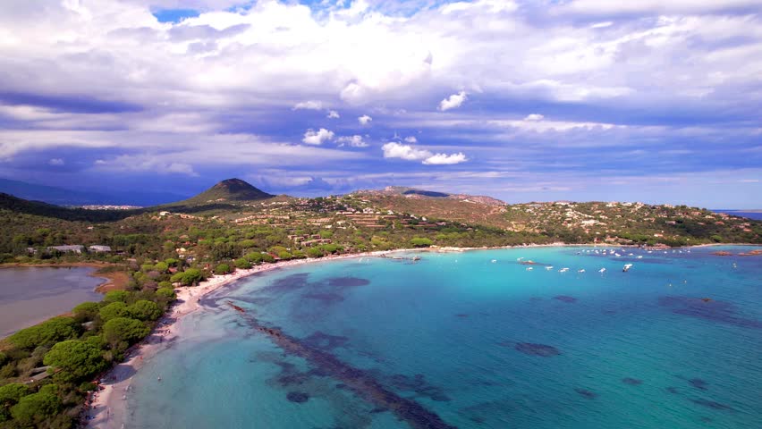 Best beaches of Corsica island. Aerial drone video of three beaches near Porto Vecchio - Santa Giulia with turquoise sea and white sand