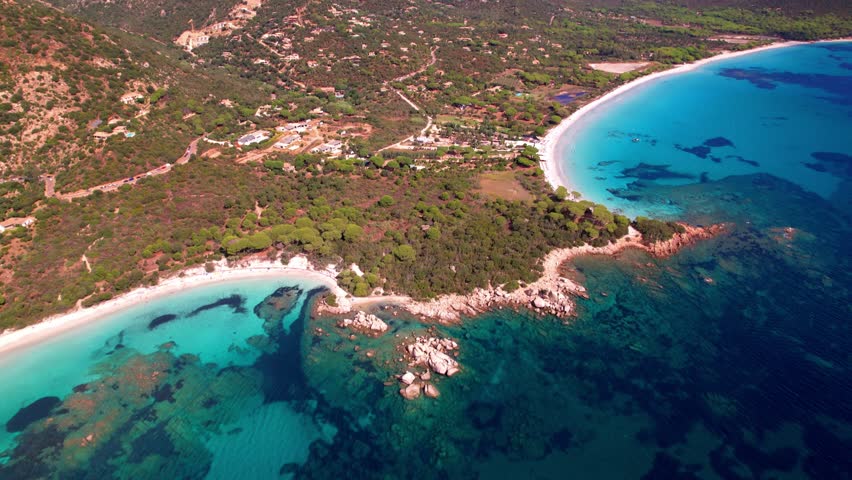 Best beaches of Corsica island. Aerial drone video of three beaches near Porto Vecchio - Palombaggia, Tamaricciu, Folaca with turquoise sea and white sand