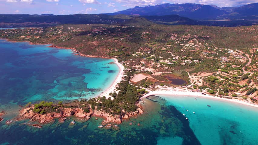Best beaches of Corsica island. Aerial drone video of three beaches near Porto Vecchio - Palombaggia, Tamaricciu, Folaca with turquoise sea and white sand