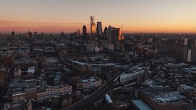 Square Mile, City of London, Establishing Aerial View Shot of London UK, United Kingdom, red rise